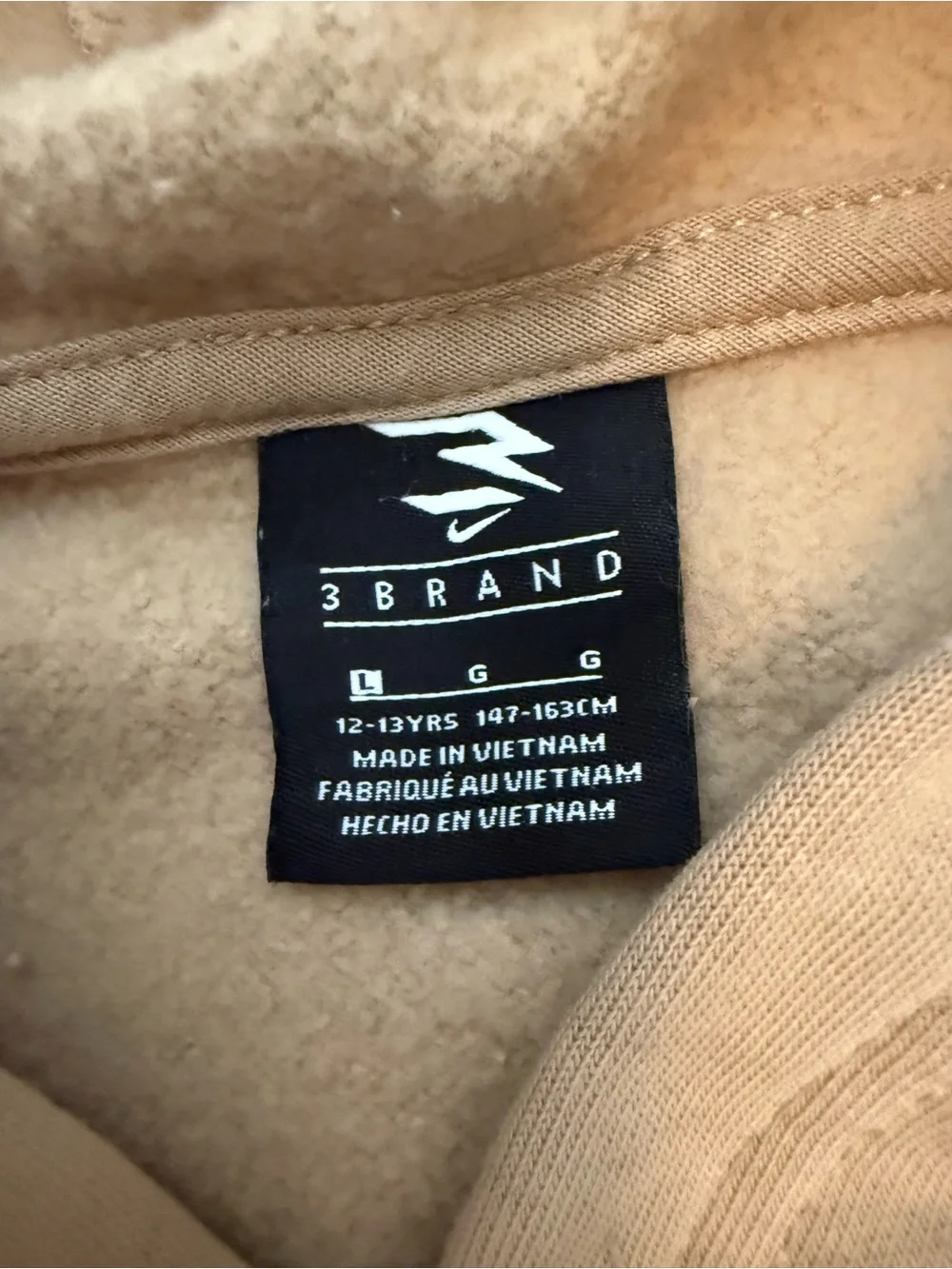 Nike boys Tan Pullover Hoodie with White Swoosh Graphic